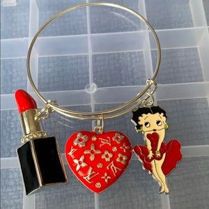 Silver plated bangle with charms